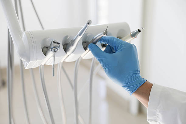 Professional Tooth Extraction technician working in Energy, IL
